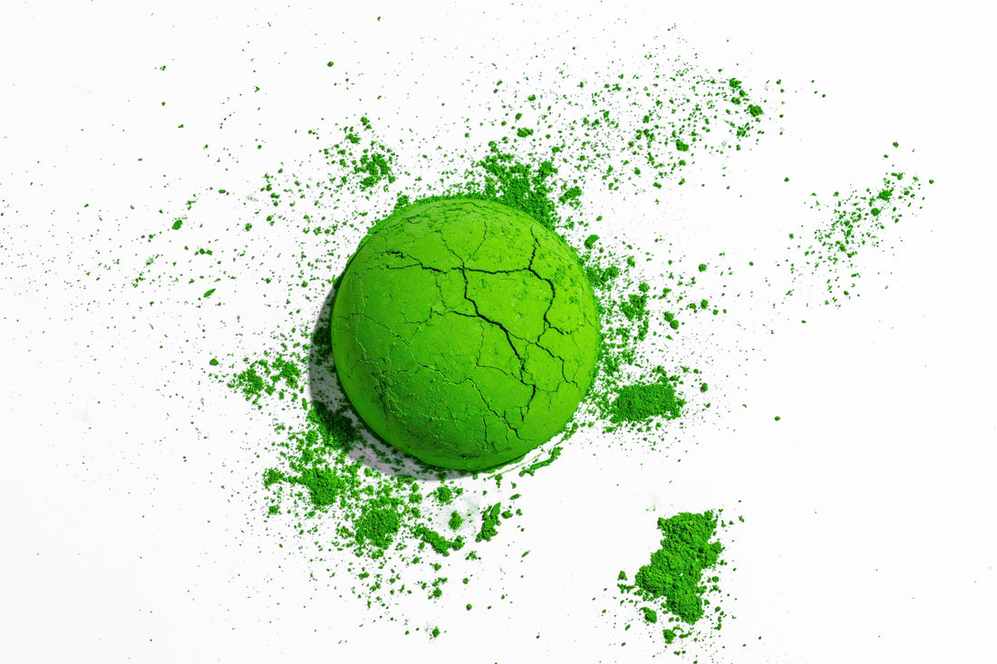 Ceremonial grade matcha powder ball showing vibrant green colour and fine texture